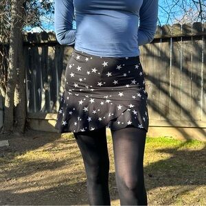 Nasty Gal black mini skirt with white stars size 6